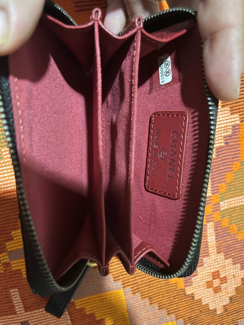 Zipped genuine leather card holder / wallet (Category: Purses & Pouches) located in Makati City. Submitted by gapofa (Listing ID 1348180986, Image 2). Description: Excellent condition - fabric interior. designed like the Ch*n*l boy collection No box..