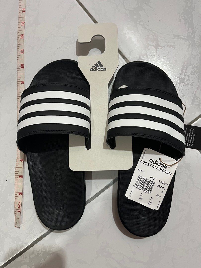 ADIDAS ADILETTE COMFORT SLIDES (Category: Slippers and slides) located in Lucena. Submitted by pankeikk (Listing ID 1348417597, Image 1). Description: ADIDAS ADILETTE COMFORT SLIDES FOR SALE BRAND NEW! RFS: bought the wrong size :(( SRP: 2,300php OUR PRICE: 2,000 ❤️ .
