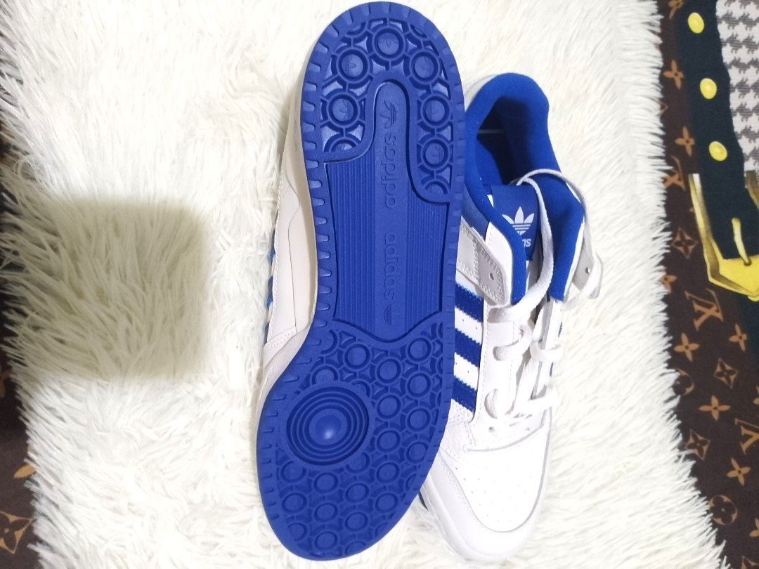 Adidas Forum Low Cl Core White/ Royal Blue/ Core White (Category: Sneakers) located in Dasmarinas. Submitted by monching123 (Listing ID 1348420517, Image 2). Description: Adidas Forum Low Cl Core White/ Royal Blue/ Core White This pair of adidas Forum Low CL shoes gives you the perfect balance of laid-back and retro style. You have nonstop comfort, thanks to a premium leather upper and soft textile lining. These versatile shoes are a wardrobe sta