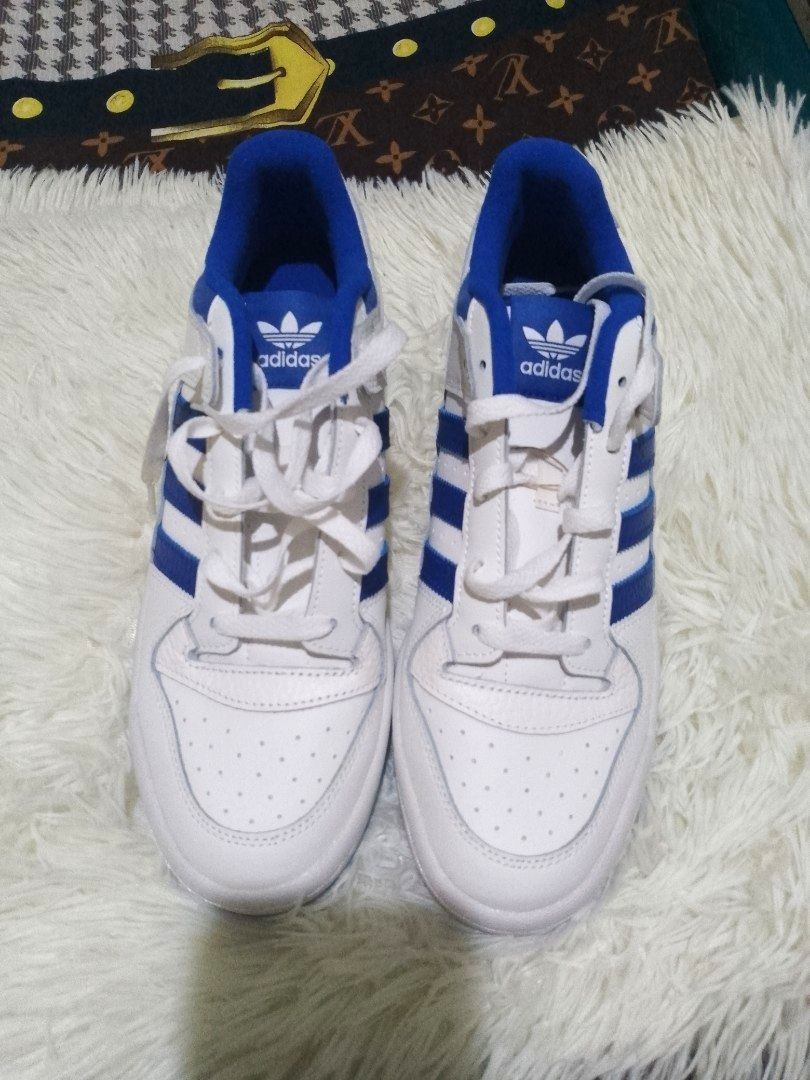 Adidas Forum Low Cl Core White/ Royal Blue/ Core White (Category: Sneakers) located in Dasmarinas. Submitted by monching123 (Listing ID 1348420517, Image 3). Description: Adidas Forum Low Cl Core White/ Royal Blue/ Core White This pair of adidas Forum Low CL shoes gives you the perfect balance of laid-back and retro style. You have nonstop comfort, thanks to a premium leather upper and soft textile lining. These versatile shoes are a wardrobe sta