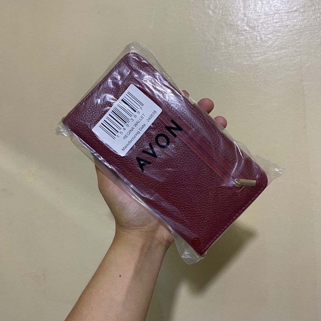 AVON REGINA WALLET WITH LONG STRAP (Category: Wallets & Card holders) located in Quezon City. Submitted by xtian.store (Listing ID 1348265363, Image 1). Description: BRAND NEW AND ORIGINAL WITH STRAP THAT IS 43 INCHES LONG.