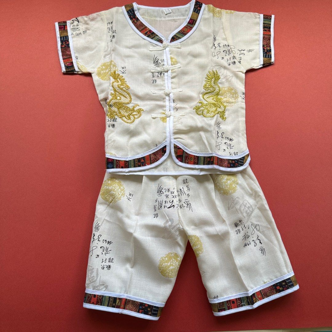 Chinese Set White and Gold (3-4 yo) (Category: Babies & Kids Fashion) located in Quezon City. Submitted by hidden.panda (Listing ID 1348320841, Image 1). Description: *Gifted from China * Beautiful pattern on material * Garterized pants * size XL fits 3-4 year olds #chinesenewyear #lunarnewyear.
