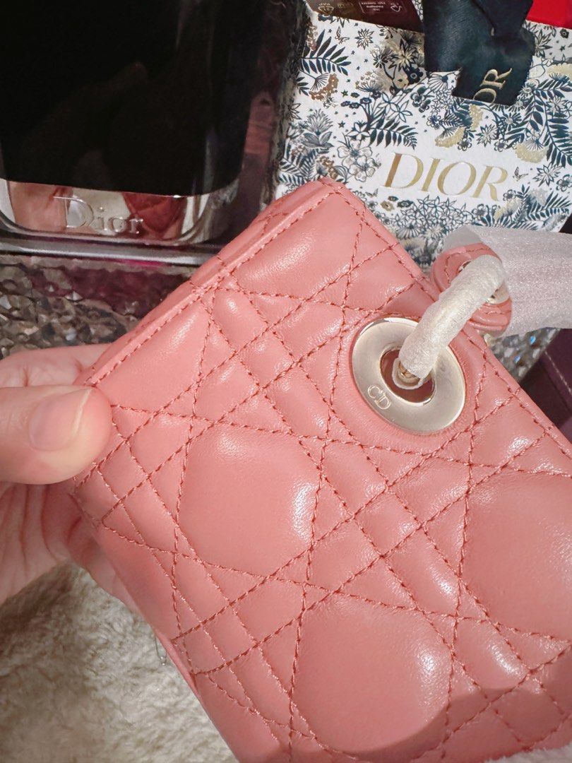 Djoy Micro (Category: Bags & Wallets) located in Batu Caves. Submitted by ahbmm (Listing ID 1348225501, Image 2). Description: - D.I.O.R. charm - Removable chain strap - Removable and adjustable leather - shoulder strap - Made in Italy - Rose gold color.