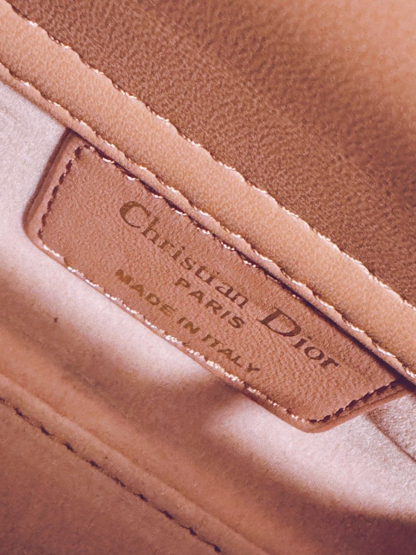Djoy Micro (Category: Bags & Wallets) located in Batu Caves. Submitted by ahbmm (Listing ID 1348225501, Image 3). Description: - D.I.O.R. charm - Removable chain strap - Removable and adjustable leather - shoulder strap - Made in Italy - Rose gold color.