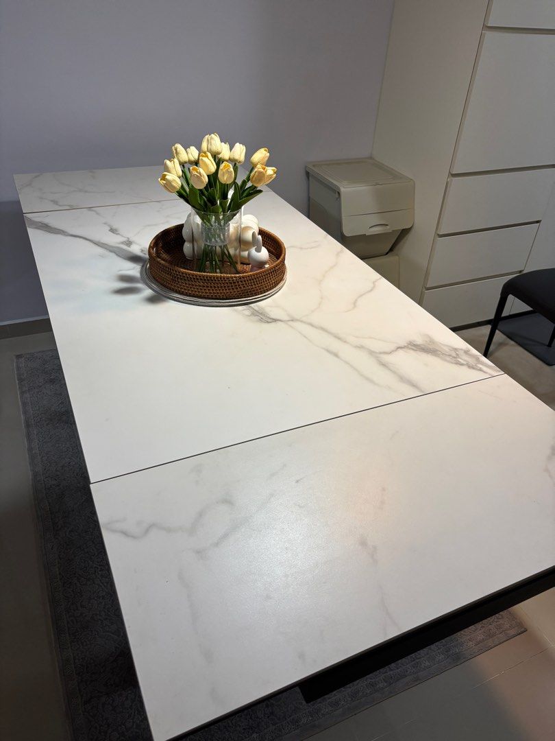 Extendable Dining Table (Category: Tables & Sets) located in Singapore. Submitted by tf_131121 (Listing ID 1348352384, Image 3). Description: Extendable dining table in excellent condition, no scratches. Features a sleek design with a sturdy build, perfect for both everyday meals and hosting guests. Easily expands to accommodate more seating. Dimensions (m): 1.2 x 0.85 Extended length - 1.95 x 0.85..