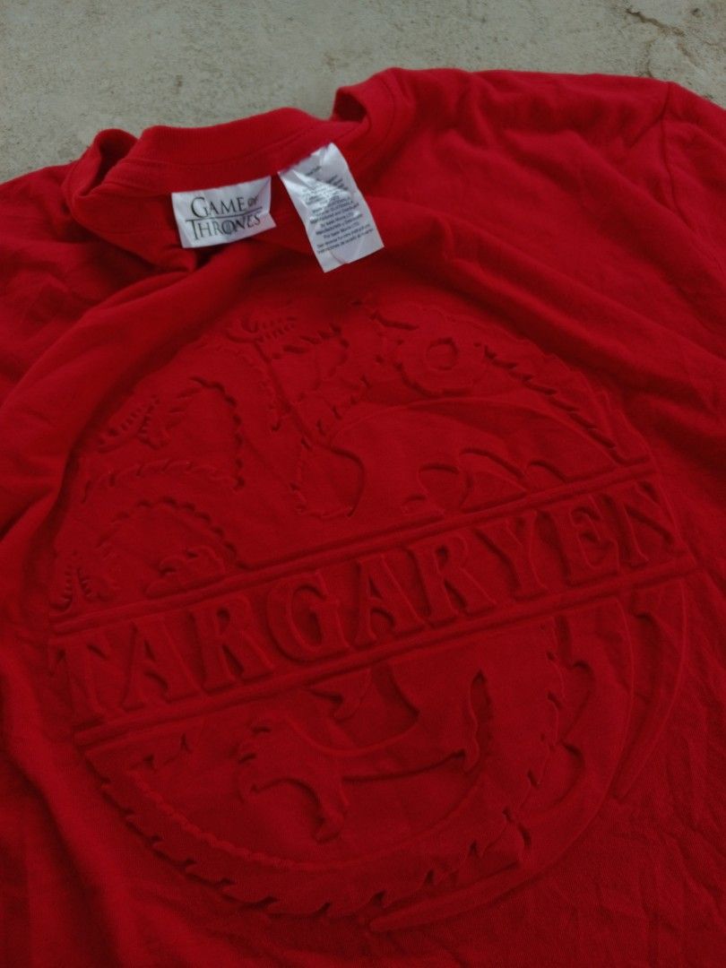 Game of Thrones shirt, embossed design (Category: Tshirts & Polo Shirts ) located in Lingayen. Submitted by answ3r (Listing ID 1348398987, Image 1). Description: Game of Thrones (0fficial Merch dated 2018) (embossed design) (fav‼️🔥) Width x Length: 23 x 32 Size Fit: XL Condition: 9.5/10 as new.