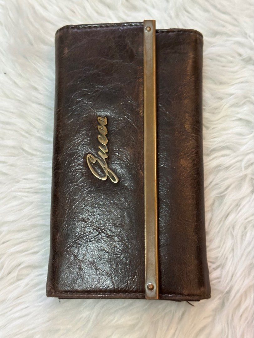 ‼️2 WALLETS-GUESS women's & Bruno Magli men's, Bundle Sale, 2 Project Wallets (Category: Wallets & Card holders) located in Manila. Submitted by hey_ole1 (Listing ID 1348321311, Image 2). Description: Decluttering personal wallets 1) Guess women's long wallet 17cmx10, dark brown, bought fr US 2) Bruno Magli men's wallet, black With rubs on corners, needs cleaning, still usable, manage your expectations Payment first Prefers buyer fr Metro Manila 