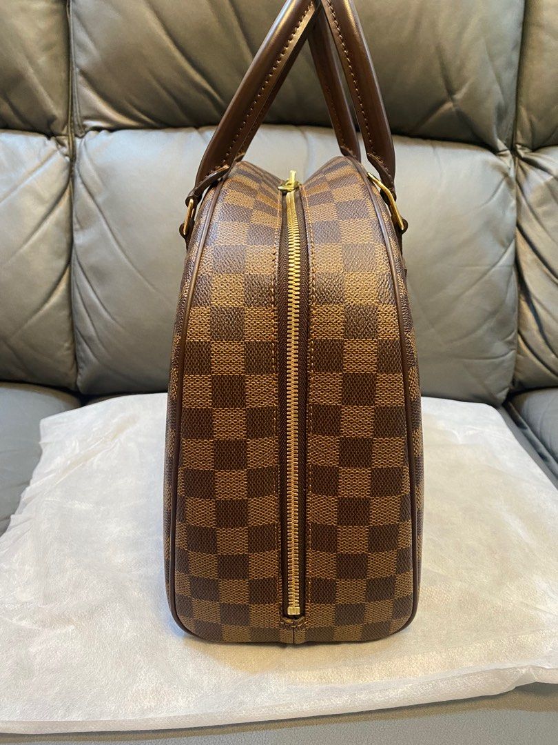Louis Vuitton Nolita MM (Category: Luxury Bags & Wallets) located in Paranaque City. Submitted by juju_closet (Listing ID 1348392711, Image 3). Description: Selling my moms LV Nolita MM :)) Used twice to the office only, 10/10 condition Price is negotiable just PM me!.
