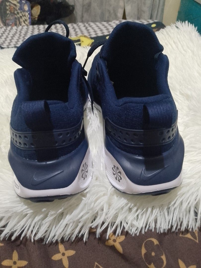 NIKE - REACTX INFINITY RUN 4 (Category: Sneakers) located in Dasmarinas. Submitted by monching123 (Listing ID 1348419795, Image 3). Description: NIKE - REACTX INFINITY RUN 4 Size 10.5 US 9.5 UK Dark blue/gray/white Maximum cushioning provides elevated comfort for everyday runs. Experience a soft, rocker-shaped platform made with new ReactX foam underfoot, and an ultra-comfortable collar and tongue for a snug feel. Plus, a water-resistant membrane