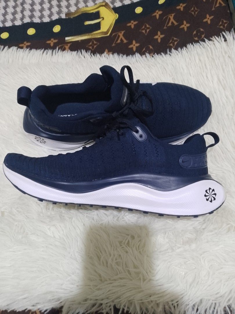 NIKE - REACTX INFINITY RUN 4 (Category: Sneakers) located in Dasmarinas. Submitted by monching123 (Listing ID 1348419795, Image 2). Description: NIKE - REACTX INFINITY RUN 4 Size 10.5 US 9.5 UK Dark blue/gray/white Maximum cushioning provides elevated comfort for everyday runs. Experience a soft, rocker-shaped platform made with new ReactX foam underfoot, and an ultra-comfortable collar and tongue for a snug feel. Plus, a water-resistant membrane