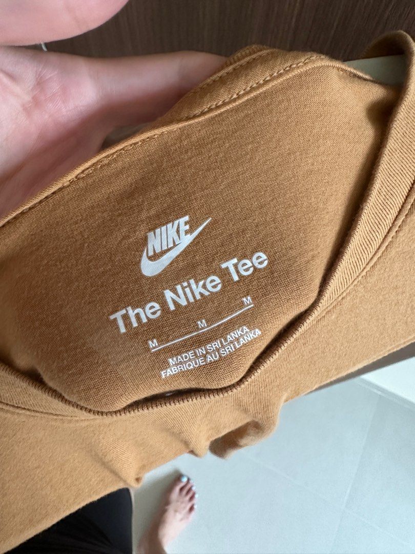 Nike Basic Tshirt (Category: Shirts) located in Singapore. Submitted by haeseam (Listing ID 1348260402, Image 3). Description: Color: Caramel Worn once..