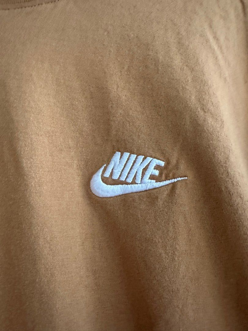 Nike Basic Tshirt (Category: Shirts) located in Singapore. Submitted by haeseam (Listing ID 1348260402, Image 2). Description: Color: Caramel Worn once..