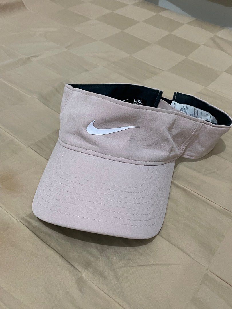 Nike Dri Fit Ace Visor Cap in Pink (Category: Hats & Beanies) located in Manila. Submitted by _everythinguwant__ (Listing ID 1348400047, Image 2). Description: - used only once - super comfy to wear - rfs: decluttering.