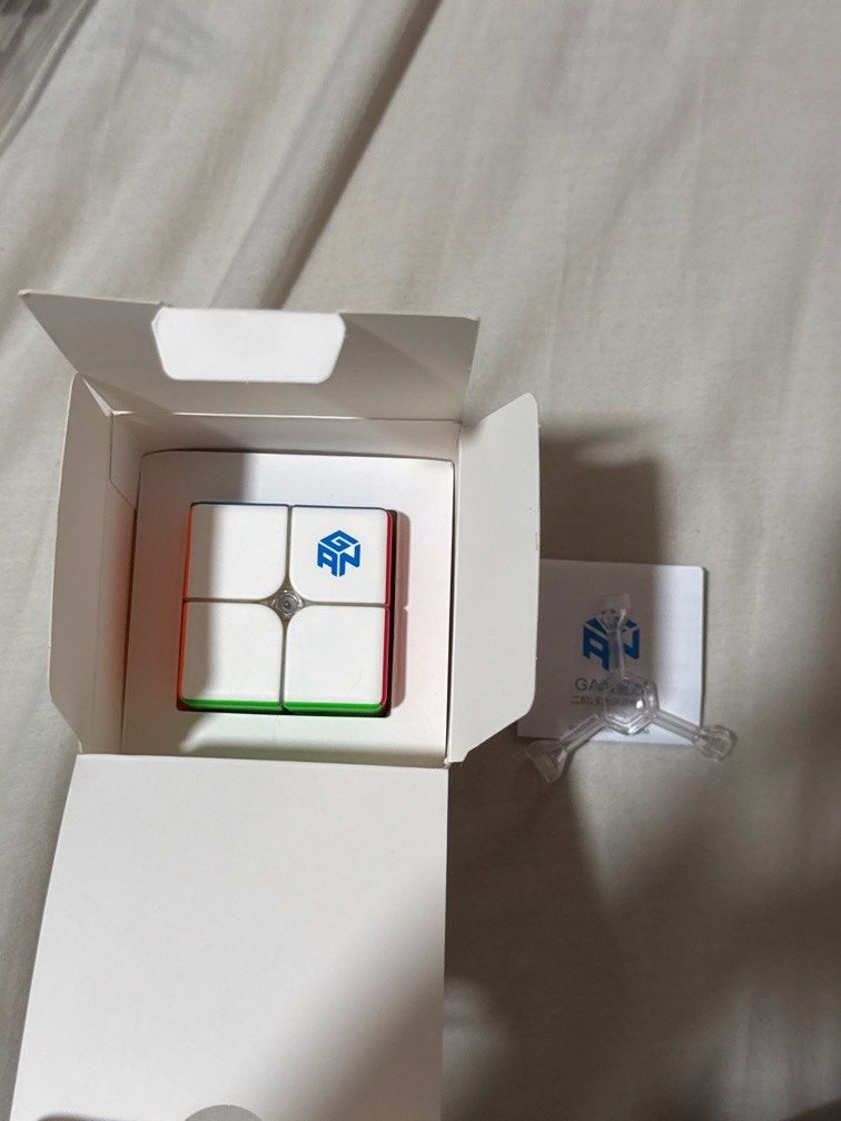 ORIGINAL 2x2 GAN249 v2 (Category: Computer Parts) located in Manila. Submitted by _pikachu__ (Listing ID 1348312931, Image 3). Description: This item is slightly used. - 2x2 Cube - Gan tool - Guide ISSUES: The box is slightly damaged, shown in the picture.
