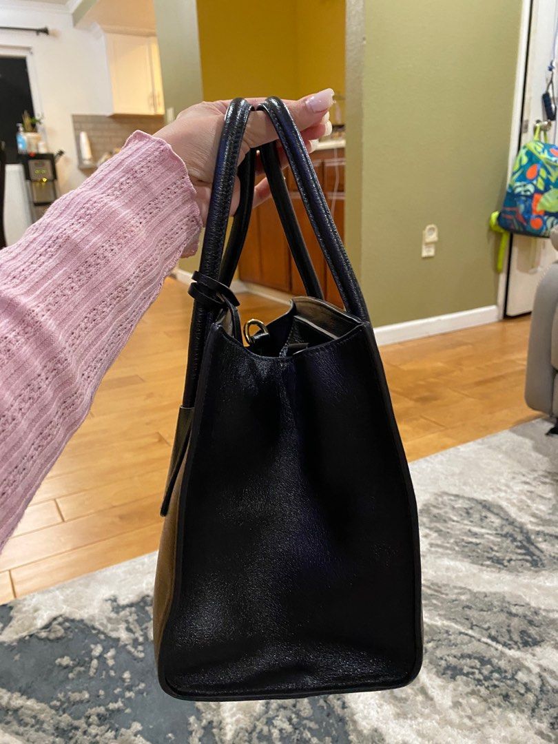 Prada 2 way bag (Category: Luxury Bags & Wallets) located in Quezon City. Submitted by bbbae (Listing ID 1348271566, Image 3). Description: Prada 2 way bag Good as new Dust bag Authenticity card.