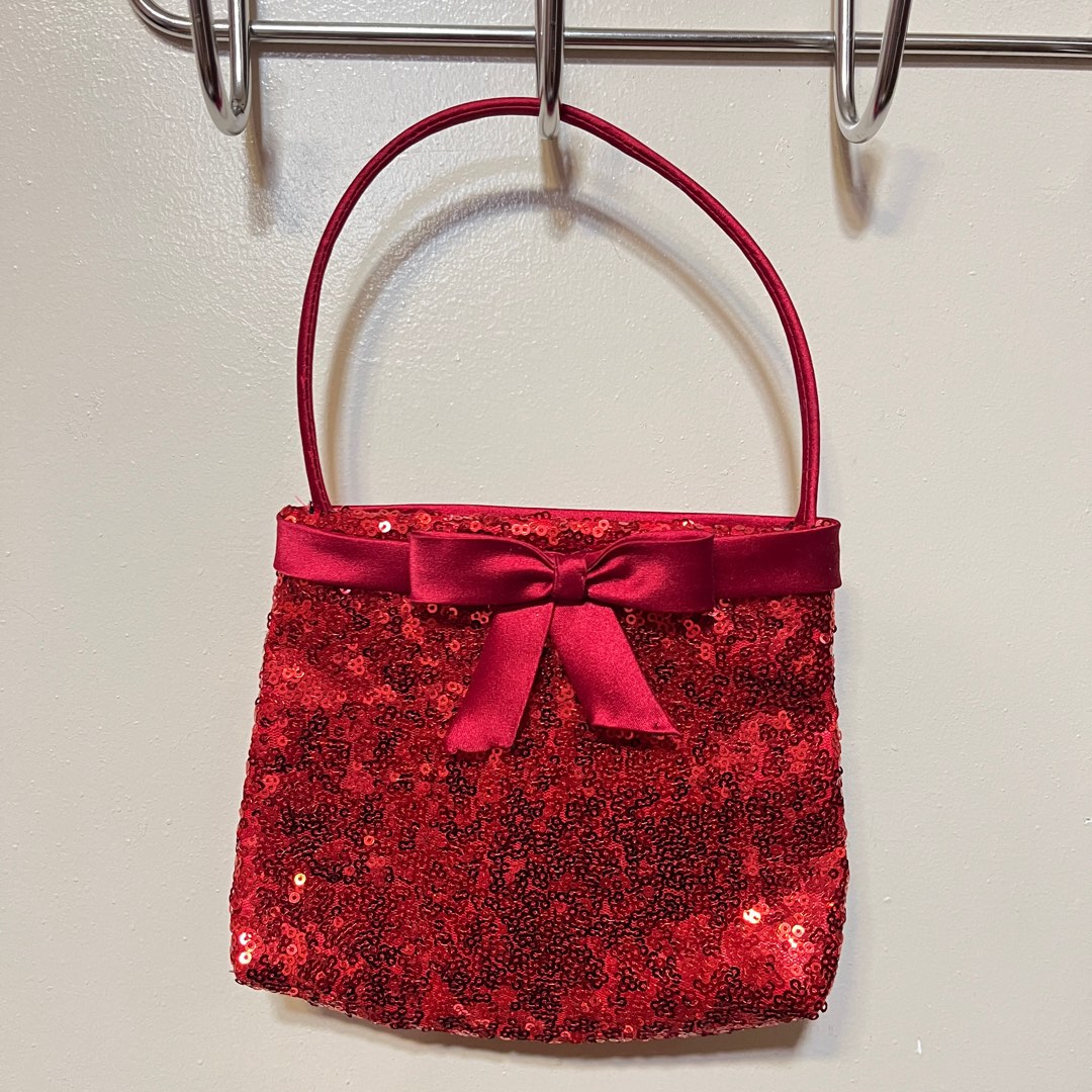 Shimmering red pouch bag, Women's Fashion, Bags & Wallets, Purses ...