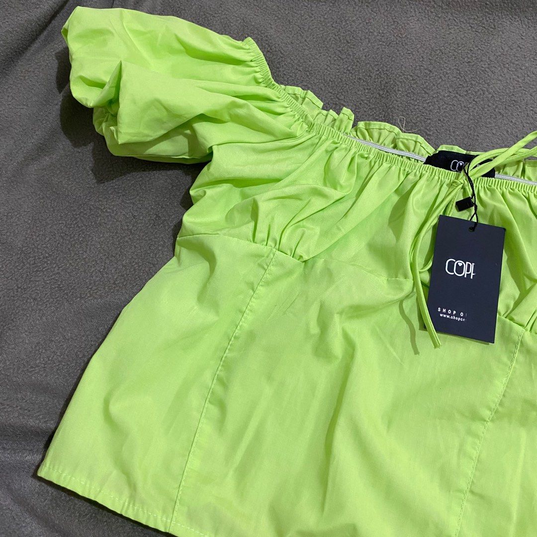 Shop copper neon cropped puffed sleeve (Category: Blouses) located in Bacolod City. Submitted by alymros (Listing ID 1348369260, Image 3). Description: Brand new Small Neon green Retro Shop copper ₱150.