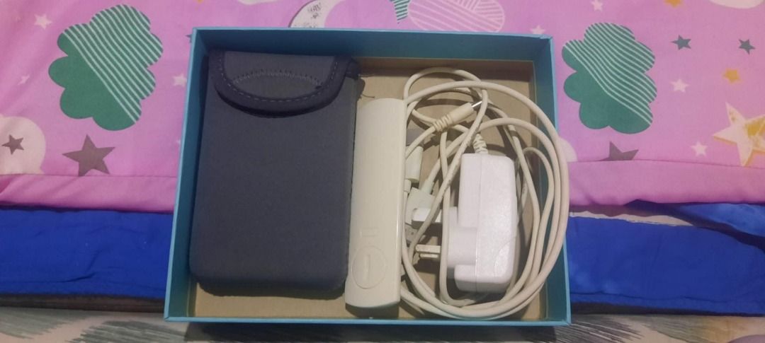 Wowoto A5 mini projector (Category: Projectors) located in Quezon City. Submitted by lueqexeselasor (Listing ID 1348330009, Image 2). Description: Complete. No Issue. PM me for details.