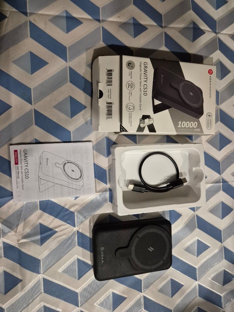 ADAM ELEMENTS (Category: Batteries & Power Banks) located in Kuala Lumpur. Submitted by stephenphang (Listing ID 1345033883, Image 1). Description: Adam elements Gravity CS10 Magnetic Power Bank with Foldable Stand.