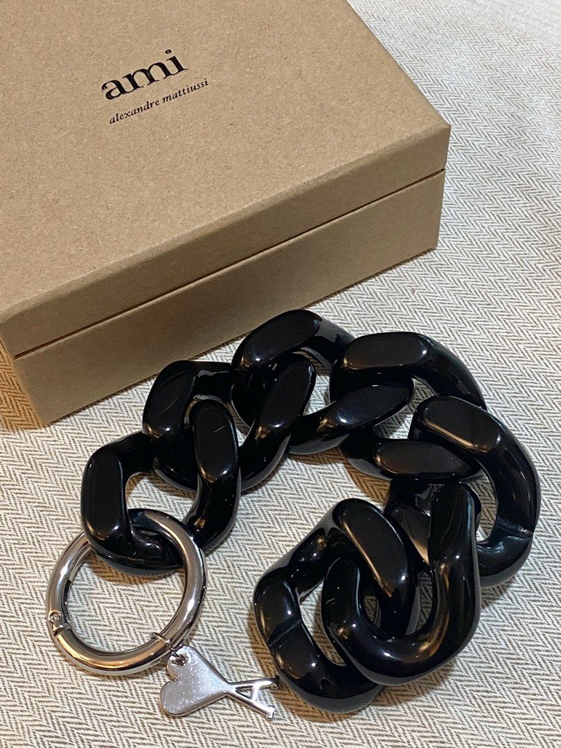AMI De Coeur Bracelet (Category: Luxury Accessories) located in Pasig City. Submitted by halffullbutneverfull (Listing ID 1345020978, Image 2). Description: AMI Alexandre Mattiussi Ami De Coeur bracelet Curb chain link in black acrylic Logo charm in silver-tone .