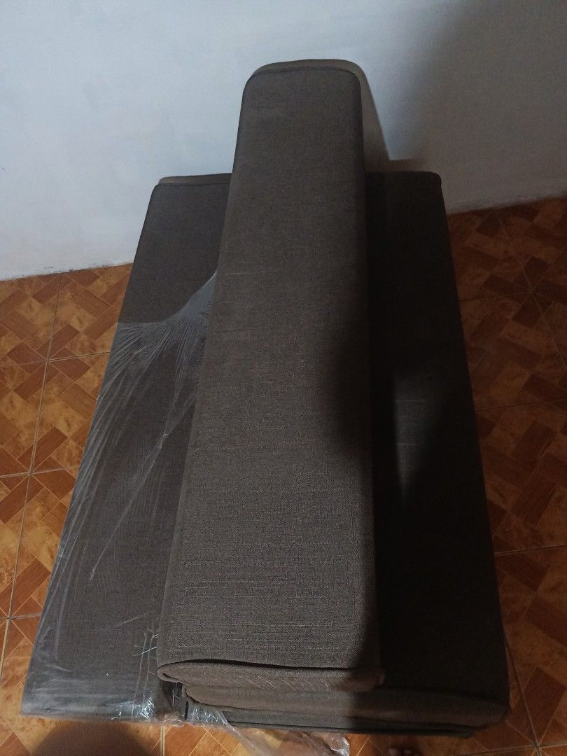 CONVERTABLE SOFA TO BED (Category: Sofas) located in Manila. Submitted by kayouyukiro (Listing ID 1345111753, Image 2). Description: GREAT CONDITON ONLY ISSUE IS THE SMALL HOLE.