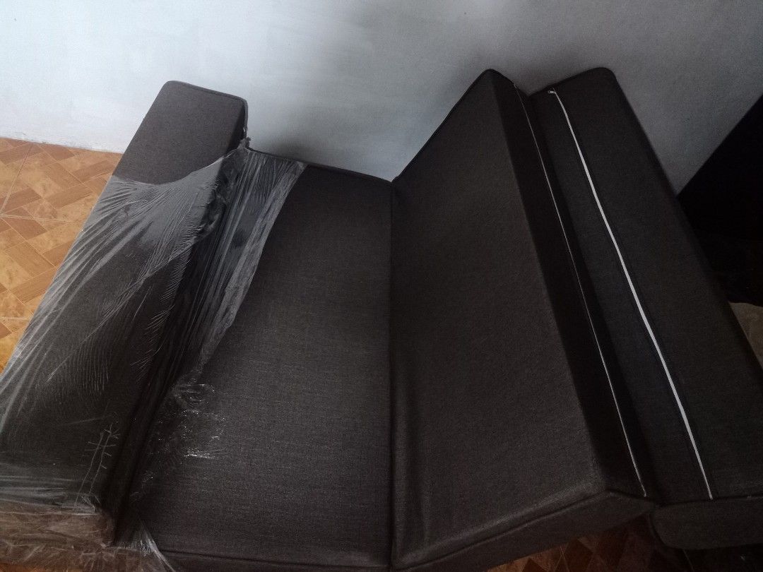 CONVERTABLE SOFA TO BED (Category: Sofas) located in Manila. Submitted by kayouyukiro (Listing ID 1345111753, Image 3). Description: GREAT CONDITON ONLY ISSUE IS THE SMALL HOLE.