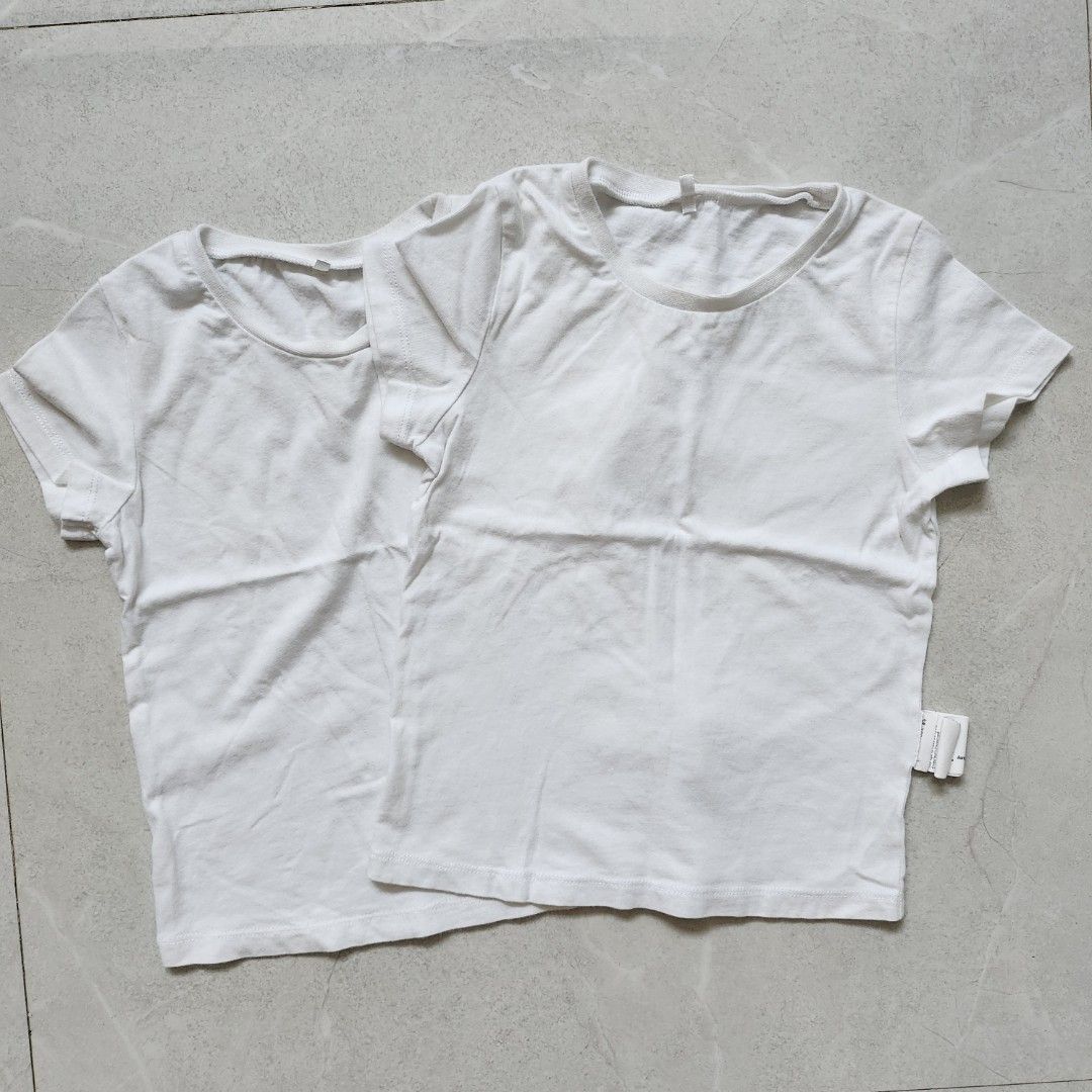 Decathlon White Shirts for Kids (Category: Babies & Kids Fashion) located in Rizal. Submitted by acs_747 (Listing ID 1345107206, Image 1). Description: 2 pcs Decathlon plain white shirts for 1 to 3 years old. P50 each..