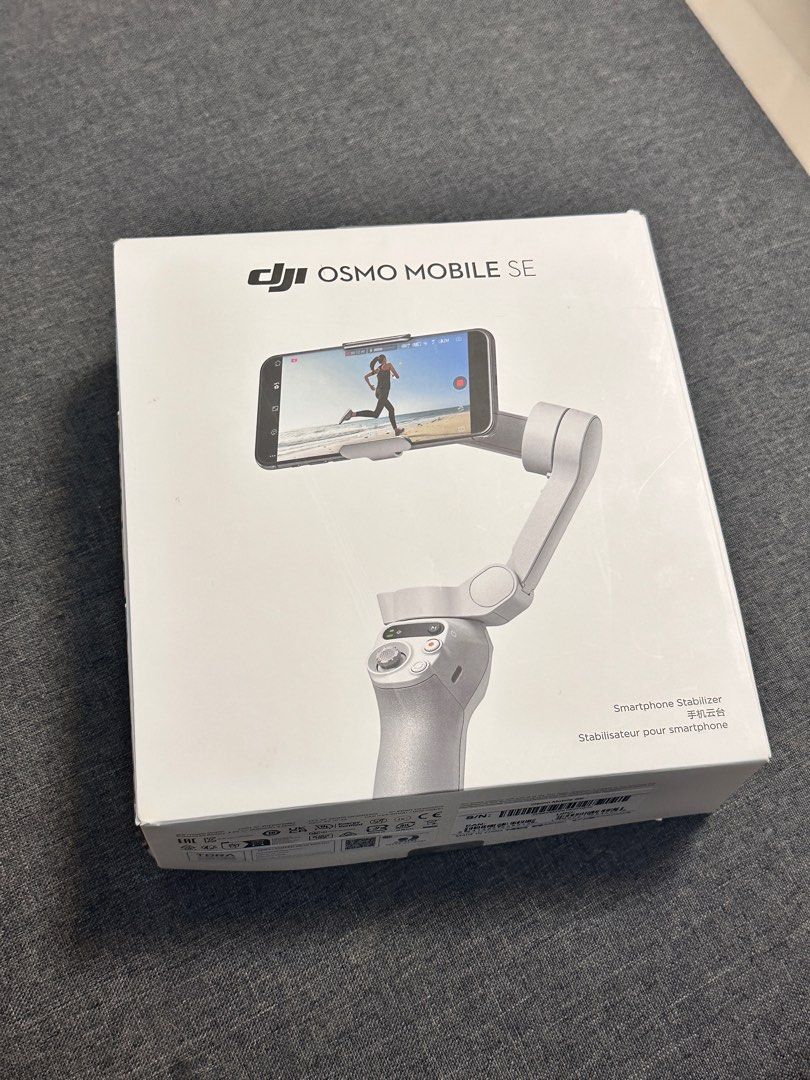 DJI Osmo Mobile SE Gimbal (Category: Other Mobile & Gadget Accessories) located in Imus. Submitted by jiiography (Listing ID 1344976031, Image 1). Description: DJI Osmo Mobile SE Gimbal — complete inclusions — only used once — price is negotiable ^^ rfs: decluttering loc: Imus, Cavite mod: Lalamove (SDD), JnT mop: Gcash.