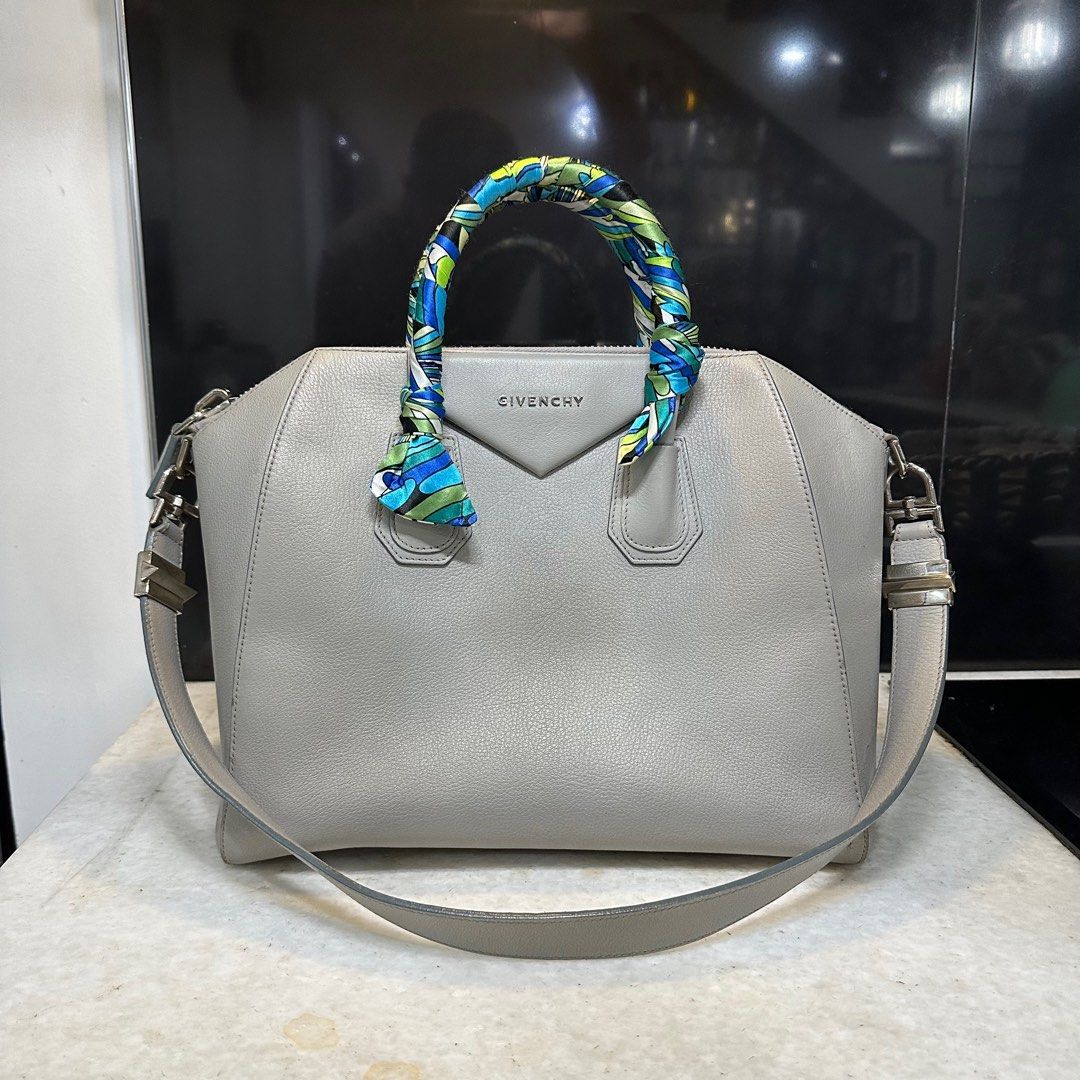 Givenchy Medium Antigona (Category: Luxury Bags & Wallets) located in Muntinlupa City. Submitted by dmacccc (Listing ID 1345045583, Image 1). Description: Givenchy Medium Antigona No other inclusions just the bag itself Guaranteed 100% Legit/Authentic Several times used with care. Issue: Cleaning only RFS : Decluttering bag collections Can do shipping thru Jnt / LBC.