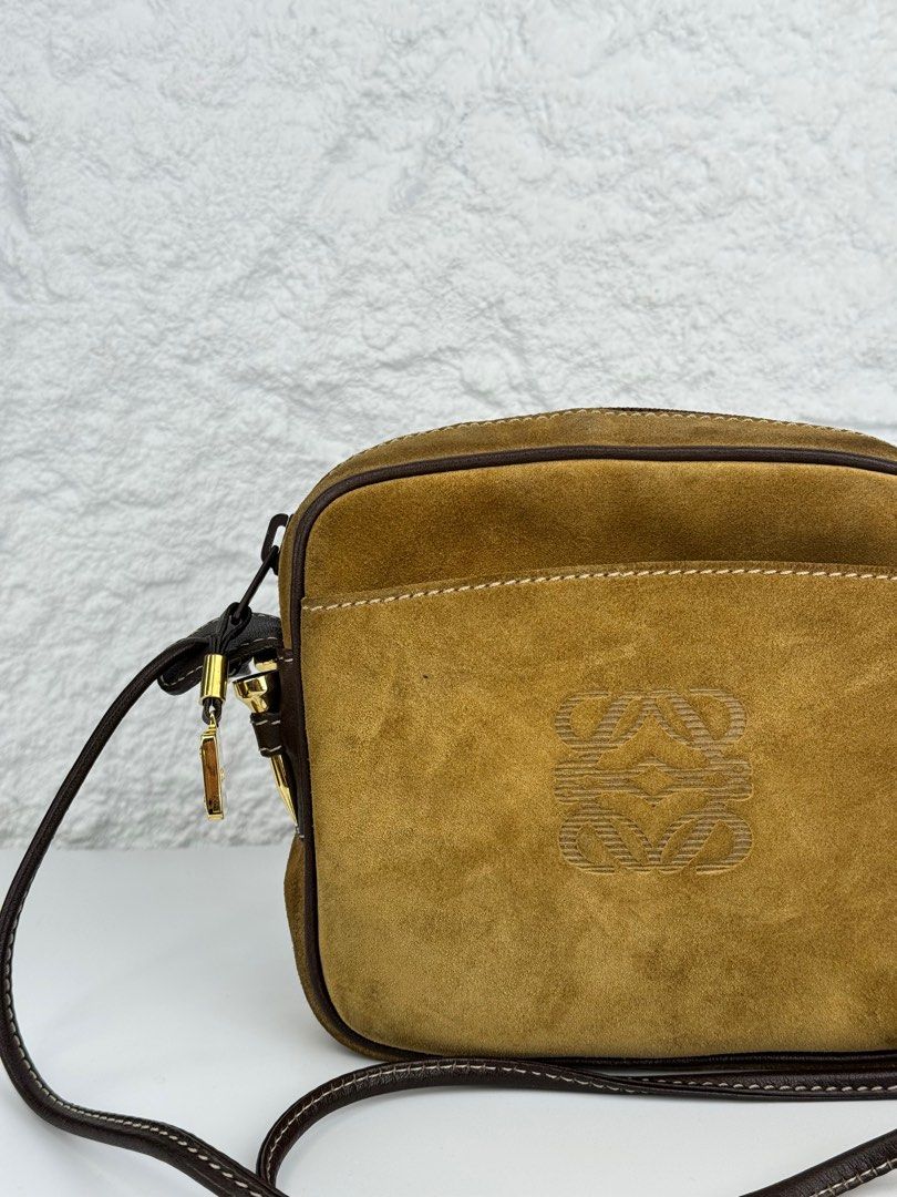LOEWE Amazona Suede (Category: Luxury Bags & Wallets) located in Manila. Submitted by luvluxe.mnl (Listing ID 1344938593, Image 2). Description: Authentic Vintage Small size With minimal stain inside but is unnoticeable when worn Very good condition.