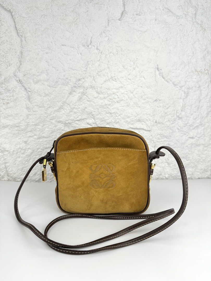 LOEWE Amazona Suede (Category: Luxury Bags & Wallets) located in Manila. Submitted by luvluxe.mnl (Listing ID 1344938593, Image 1). Description: Authentic Vintage Small size With minimal stain inside but is unnoticeable when worn Very good condition.