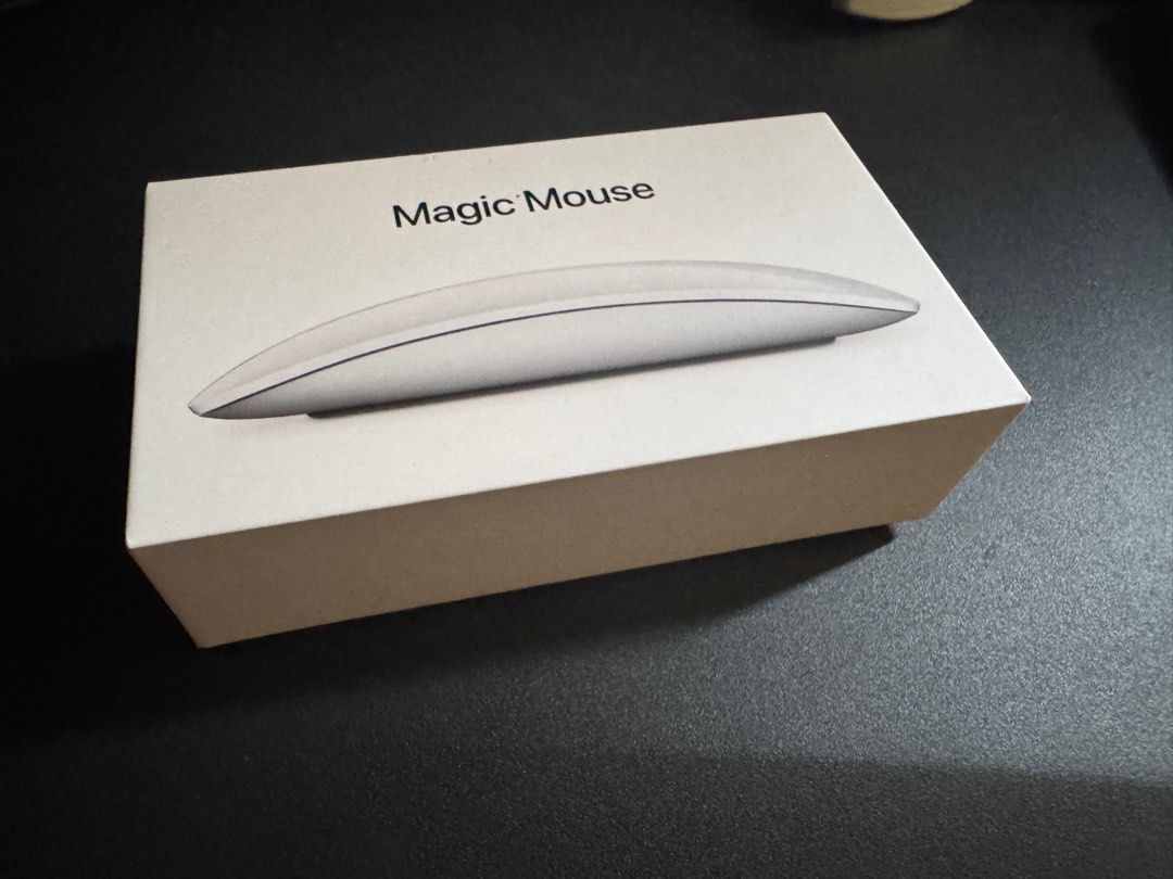 Magic Mouse (Category: Mouse & Mousepads) located in Singapore. Submitted by lstmark (Listing ID 1344947583, Image 1). Description: Practically brand new Magic Mouse. Only used for ~10 mins max. Tested and still working I noticed a light scratch at the top, must have happened when I was moving it around briefly. See red circle in the last picture .
