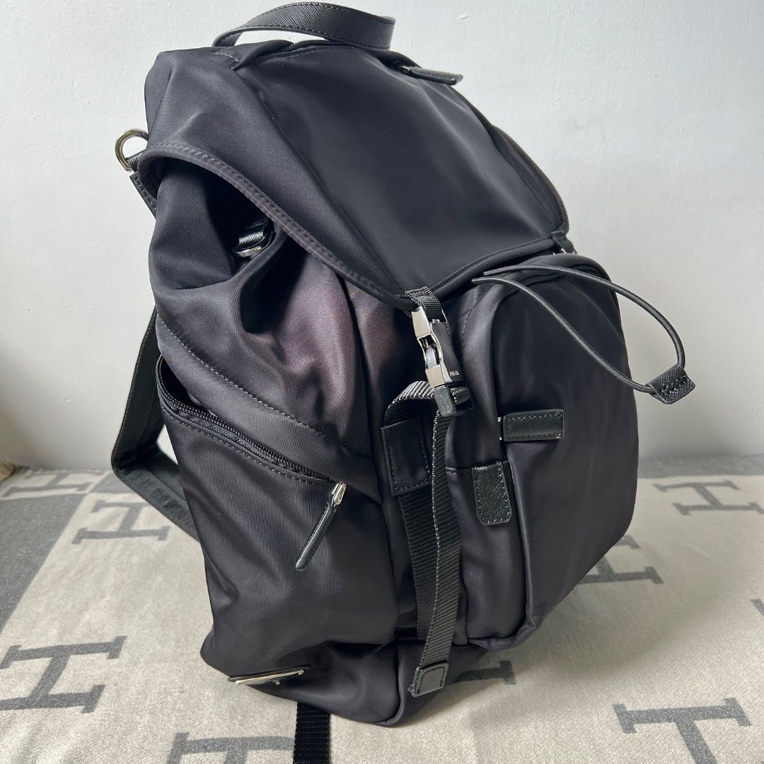 Prada Nylon Backpack 2VZ135 (Category: Luxury Bags & Wallets) located in Antipolo. Submitted by chanchimj (Listing ID 1334478012, Image 3). Description: Prada Tessuto Nylon backpack Whether it is for travel or fitness, men's backpacks must be handsome and trendy😎As a commuter match and daily outing, the backpack not only improves the appearance but also has a lot of storage👍 Size: 45x27x17cm Model: 2VZ135.