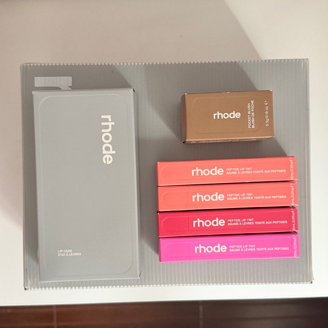 Rhode SALE: Lip Case, Lip Tint, Pocket Blush (Category: Makeup) located in Pasig City. Submitted by thereseubk (Listing ID 1344959340, Image 1). Description: All are brand new and original from the US Lip Case (15 Pro) - 1,800 Lip Tint (Peach Pit, Guava Spritz, Shortcake) - 1,400 Pocket Blush (Spicy Marg) - 1,600.
