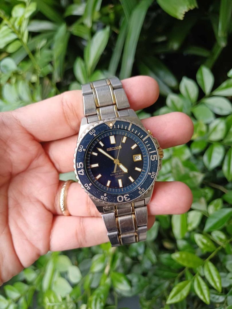 SEIKO KINETIC 100M SKA009P (Category: Luxury Watches) located in Manila. Submitted by timearcph (Listing ID 1345093649, Image 3). Description: SEIKO KINETIC 100M SKA009P Description: Rare hard to find Seiko kinetic 100m 5M62-0A10, SKA009P, two tone, blue dial(japan), blue/gold bezel insert, gold/ stainless bracelet and good lume. PRICE: 8,000 PHP Brand: Seiko Condition: Conservative rating of 9/10. Set: Comes watch only SHIPPING: - Open to shippi