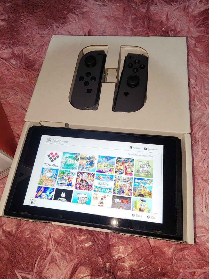 Switch v2 JB (Category: Nintendo) located in Manila. Submitted by starlord_2024 (Listing ID 1344986326, Image 2). Description: For sale or swap (Psvita, n3ds + cash) Switch v2 Jb - 10,500 Latest version Complete with box manuals Accesories , 256gb full of games No isue gagamitin nalang Manila area meetup.