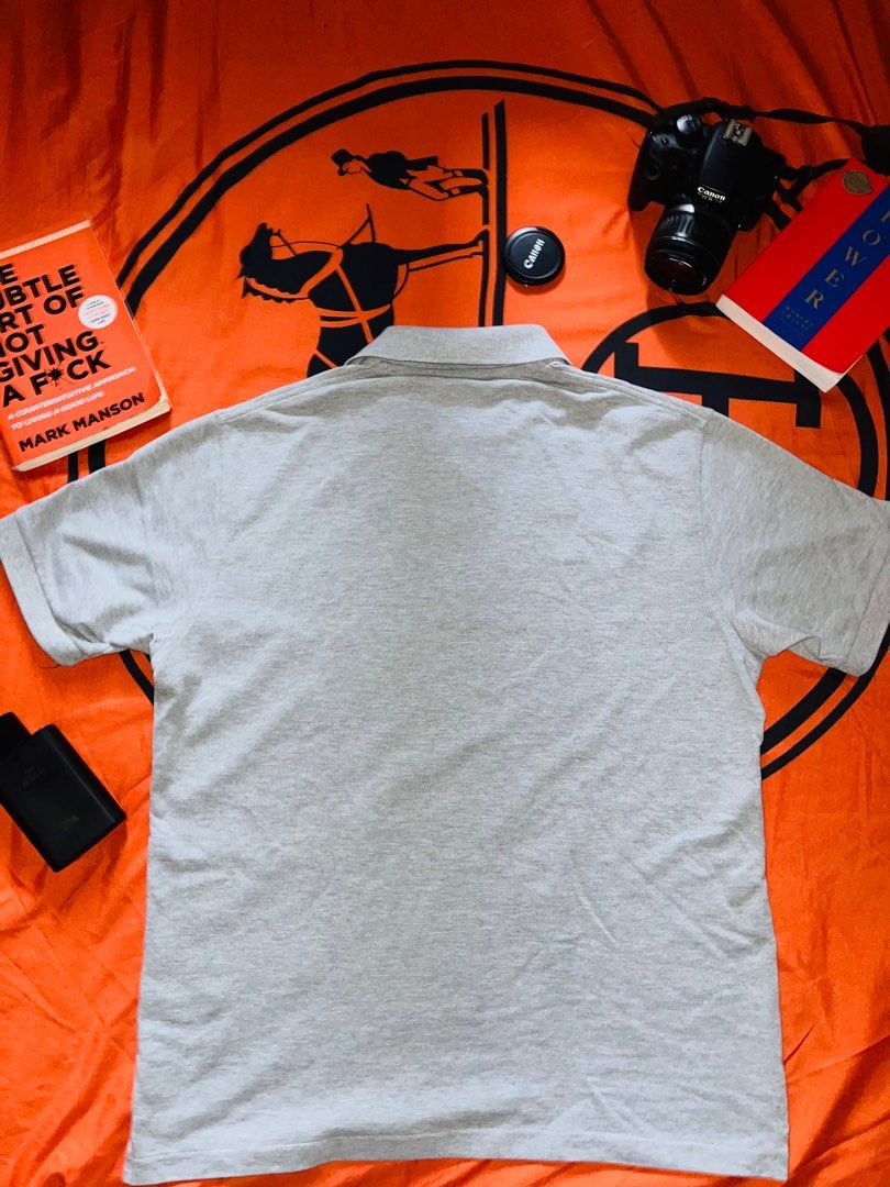 Uniqlo Gray Polo Shirt (Category: Tshirts & Polo Shirts ) located in Manila. Submitted by ascndntmnl (Listing ID 1345019740, Image 2). Description: Uniqlo Gray Polo Shirt Used only once Condition: 10/10 .