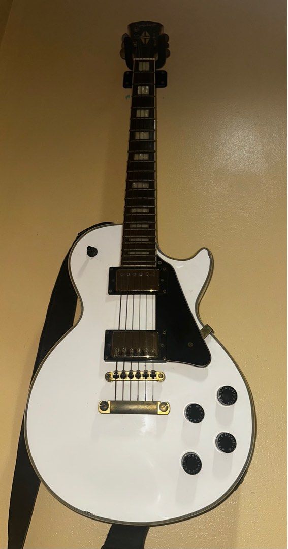 2008 Epiphone Les Paul Custom Pro Alpine White (Category: Musical Instruments) located in Pasig City. Submitted by pri14 (Listing ID 1348526028, Image 1). Description: Hello everyone! Selling my Epiphone Les Paul Custom Pro (Alpine White), one of the cheapest in the market. Guitar fully works. It has signs of use and minor chips. Paint is still intact and original. Saddles/Nut/Pickup Switch has been upgraded, all other parts (pickups, tuners, etc