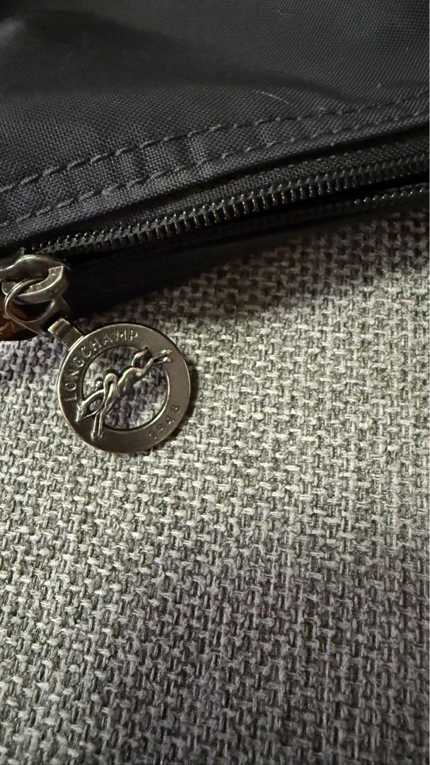 Authentic Le Pliage Long Champ Classic Medium Short handle (Category: Luxury Bags & Wallets) located in Marikina City. Submitted by lily_003 (Listing ID 1348471001, Image 3). Description: RFS. Bought a bigger one LC duffle bag Bought this in Italy.