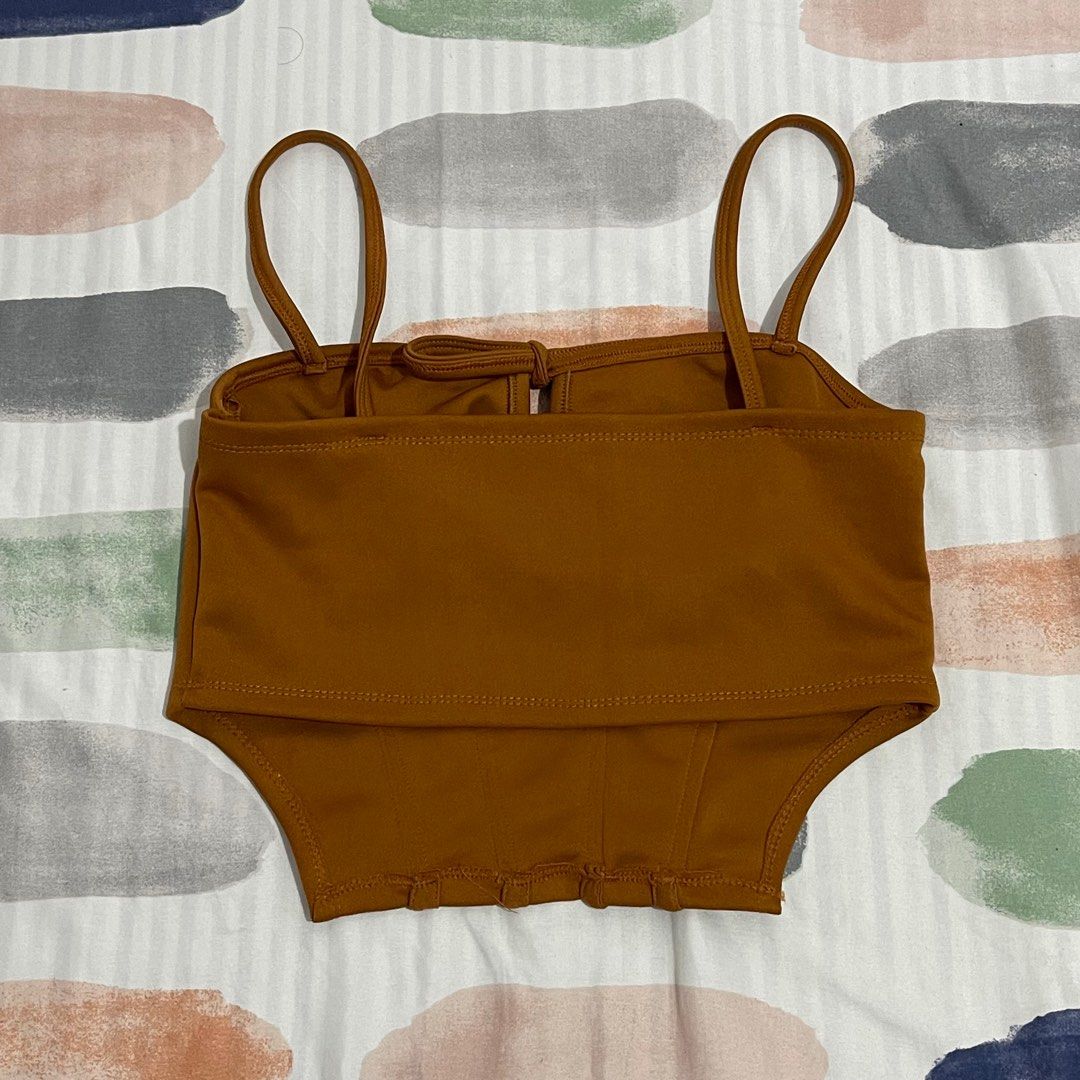 Corset Sleeveless Top (Category: Sleeveless) located in Cavite. Submitted by mxdesiree (Listing ID 1348469916, Image 2). Description: 💕💗 pre-loved item 💕💗 * Color: Chocolate Brown * Size: Small - Medium * Can send pictures and videos for more accuracy * MOP: Gcash * MOD: JNT, JRT Express, Lalamove (buyer can book on their own).