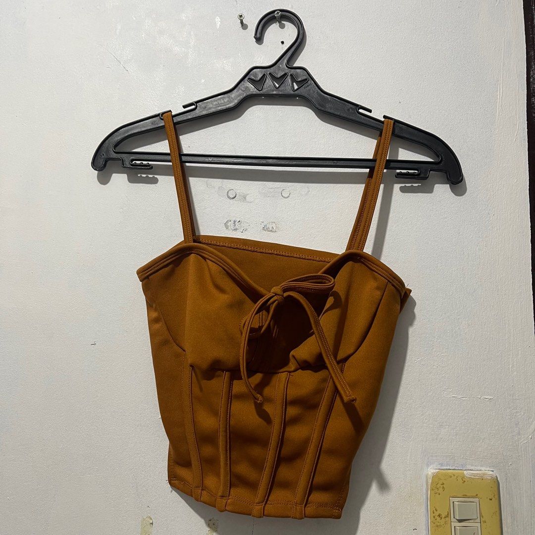 Corset Sleeveless Top (Category: Sleeveless) located in Cavite. Submitted by mxdesiree (Listing ID 1348469916, Image 3). Description: 💕💗 pre-loved item 💕💗 * Color: Chocolate Brown * Size: Small - Medium * Can send pictures and videos for more accuracy * MOP: Gcash * MOD: JNT, JRT Express, Lalamove (buyer can book on their own).