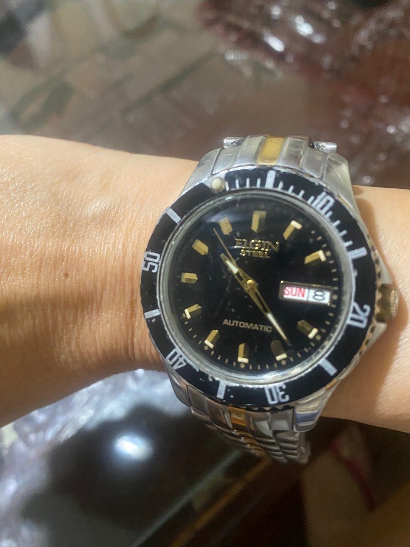 Elgin Steel Automatic Two Toned Men’s Kinetic Watch (Category: Men's Watches) located in Manila. Submitted by roseluxuryitems (Listing ID 1348581843, Image 3). Description: Elgin Steel Automatic Two Toned Men’s Kinetic Watch Good working condition 165 ft Y676A Japan made .