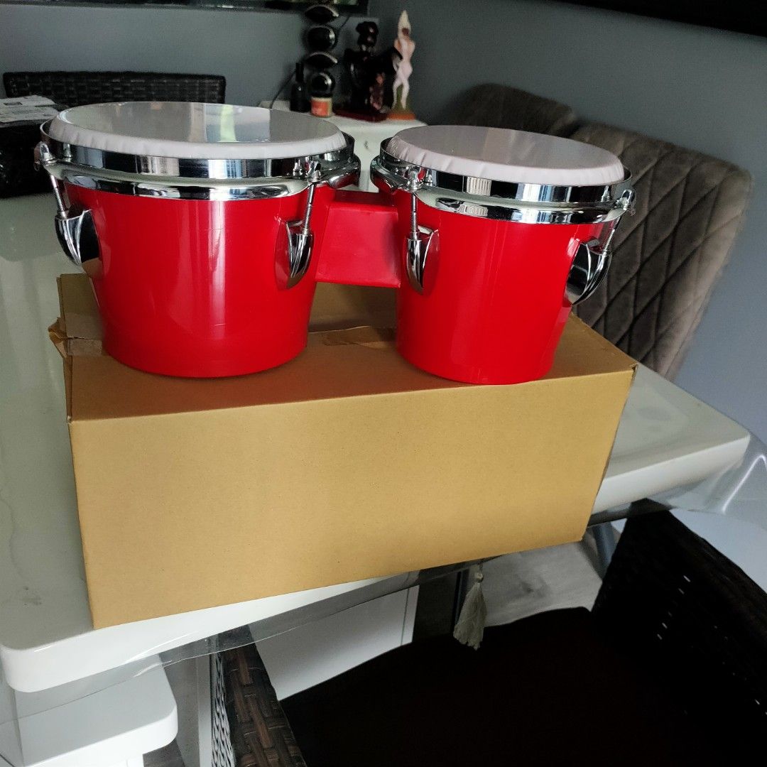 Fiber bongo (Category: Musical Instruments) located in Singapore. Submitted by ajynwa (Listing ID 1348514719, Image 2). Description: comes in n Red and Black. servicing or change new skin available.