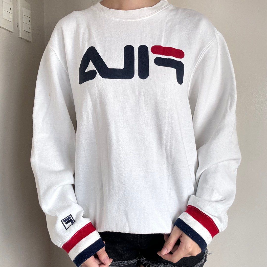 Fila Sweater (Category: Longsleeves) located in Quezon City. Submitted by luvluva (Listing ID 1348501269, Image 2). Description: Authentic. Fits S-M.