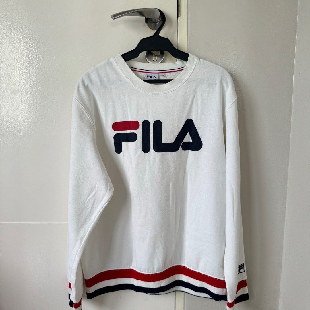 Fila Sweater (Category: Longsleeves) located in Quezon City. Submitted by luvluva (Listing ID 1348501269, Image 1). Description: Authentic. Fits S-M.