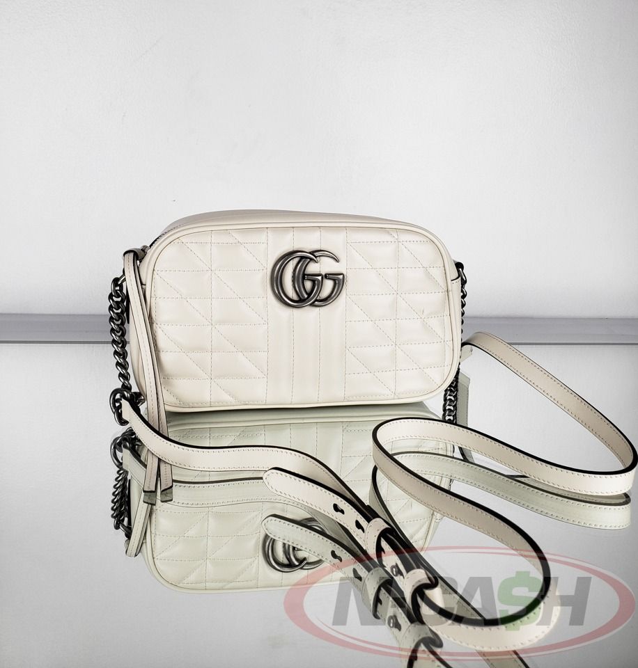 Gucci Marmont Aria Small Camera Bag (Category: Luxury Bags & Wallets) located in Quezon City. Submitted by luxury_by_n-cash (Listing ID 1348479026, Image 1). Description: N-Cash Pawnshop "Instant Cash for Bags, Watches, Cars, and Electronics" https://www.ncash-pawnshop-philippines.com/ Gucci Marmont Aria Small Camera Bag Brand New Brand: GUCCI L: 9.5″ / H: 5.5″ / D: 3″ Strap Drop 24″ (Adjustable) Material: Mystic White Calfskin Hardware: Aged Sil
