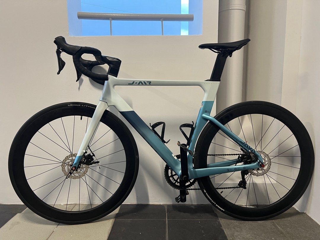 Java J Air Fuoco (Category: Bicycles) located in Singapore. Submitted by kny001 (Listing ID 1348573659, Image 1). Description: condition 8/10! , less than 2K mileage, comes with 2 bottle cage and a Giant Approach saddle, have minor scratch on right shifter and handle grip Frame size: 52 Specifications: Frame: carbon with UCI certified Fork: Carbon Shifter: Shimano 105 R7000,11 speed Front derailleur: Shimano 105 R7000 Rear derailleur: Shimano 105