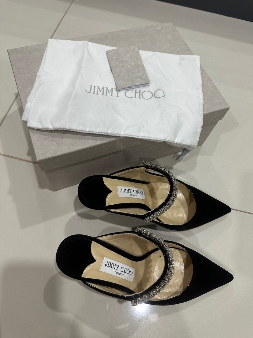 Jimmy Choo BING 65 Velvet Mule Black 38EU/37US/24cm (heels 2.5”) (Category: Flats & Sandals) located in Pasig City. Submitted by iamloveluxe (Listing ID 1348499692, Image 1). Description: SRP ₱64,500 Bought in Jimmy Choo Edsa Shangri La Super comfy sa paa, used once only Complete Inclusion Reason for Selling: Upgrade.