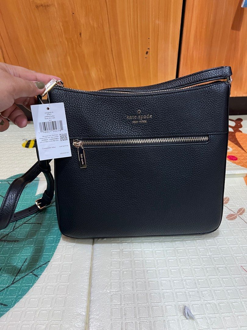 Kate Spade Lena Swingpack - Black (Category: Luxury Bags & Wallets) located in San Pedro. Submitted by misslumi (Listing ID 1348437967, Image 1). Description: BRAND NEW from US outlet store! Kate Spade Lena Swingpack - Black with tags, adjustable strap pebbled leather.
