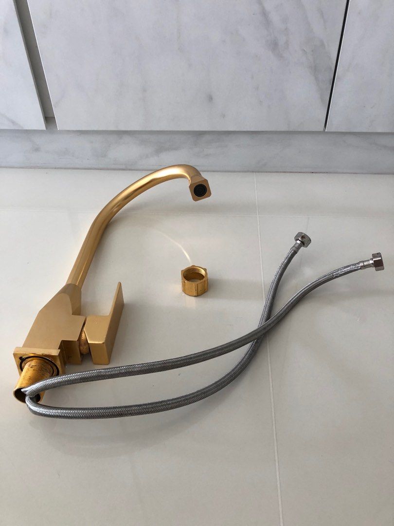 Kitchen Tap mixer (Category: Other Kitchenware & Tableware) located in Singapore. Submitted by y7m2r5k4b4 (Listing ID 1348432768, Image 1). Description: Perfect working condition kitchen Mixer tap Gold coated can swivel 360% can fixed n use . Price negotiable sell Asis. Thanks .